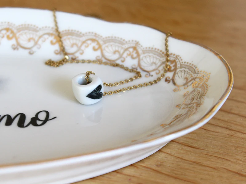 Collier perle en porcelaine
