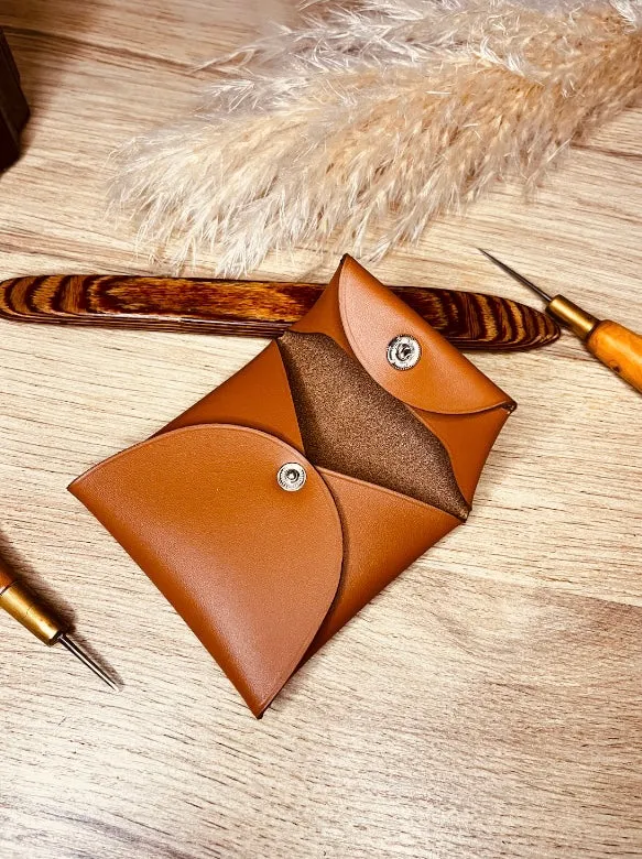 1 PORTE MONNAIE en CUIR